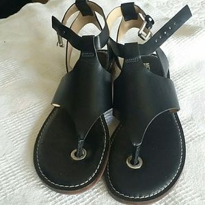 Michael Kors black leather gladiators